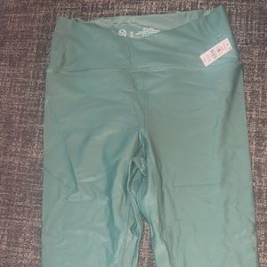 Kgmtl collection never worn still with tag green leggings